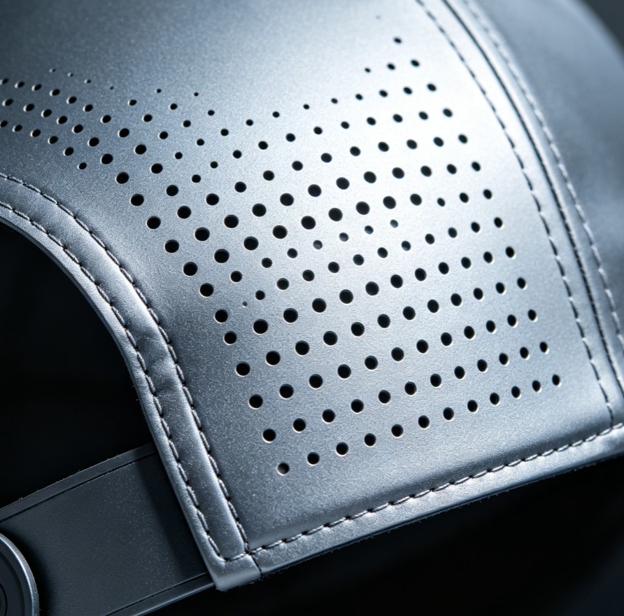 The Laser Edge: How Precision Perforation Transforms Performance Headwear Into Premium Luxury The Laser Edge: How Precision Perforation Transforms Performance Headwear Into Premium Luxury